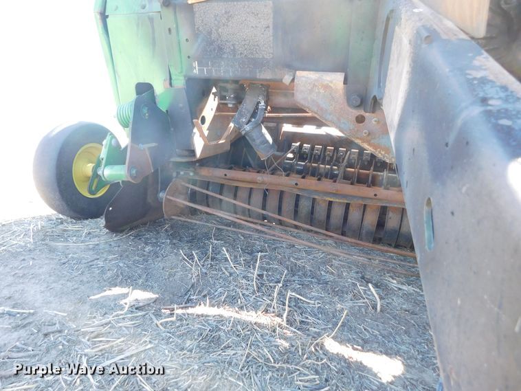 image for item DM2495 2012 John Deere 569  round baler