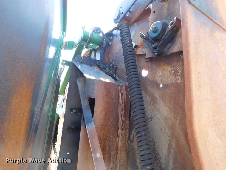 image for item DM2495 2012 John Deere 569  round baler