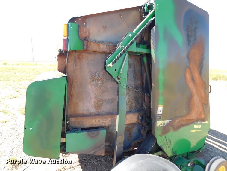 image for item DM2495 2012 John Deere 569  round baler