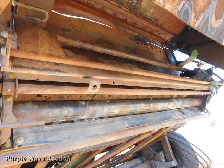 image for item DM2495 2012 John Deere 569  round baler