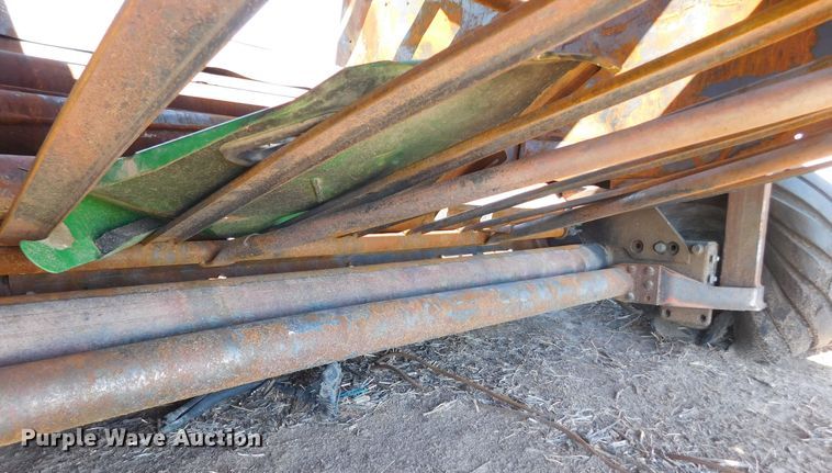 image for item DM2495 2012 John Deere 569  round baler