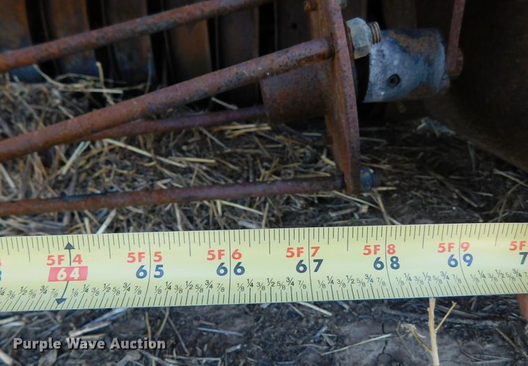 image for item DM2495 2012 John Deere 569  round baler