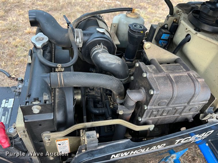 image for item IA9085 New Holland TC24D  MFWD tractor