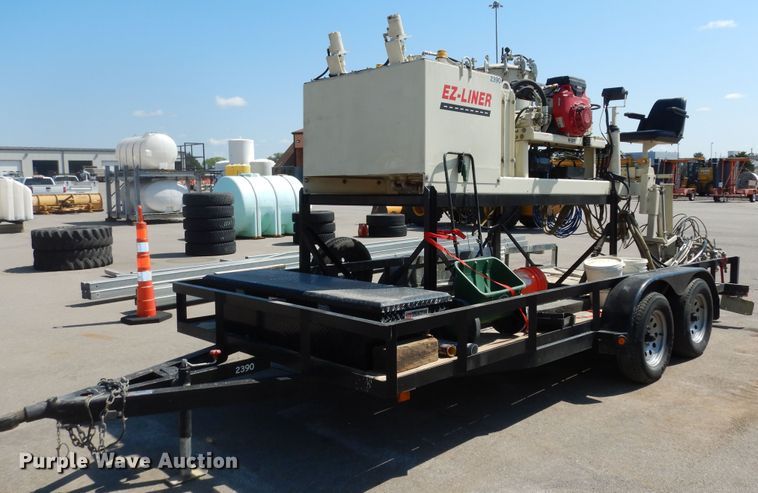 image for item LR9882 EZ-Liner AL-120  paint striper with Jim's utility trailer