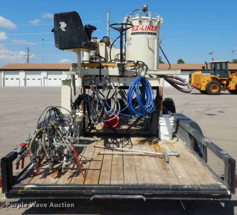 image for item LR9882 EZ-Liner AL-120  paint striper with Jim's utility trailer