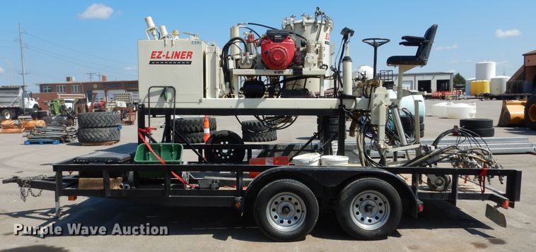 image for item LR9882 EZ-Liner AL-120  paint striper with Jim's utility trailer