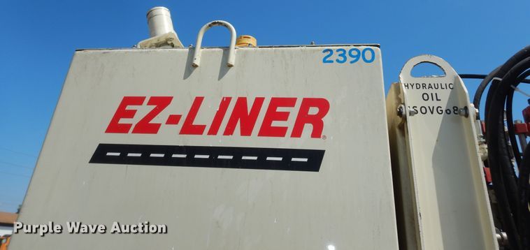 image for item LR9882 EZ-Liner AL-120  paint striper with Jim's utility trailer