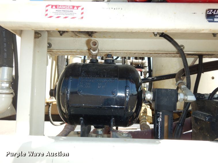 image for item LR9882 EZ-Liner AL-120  paint striper with Jim's utility trailer