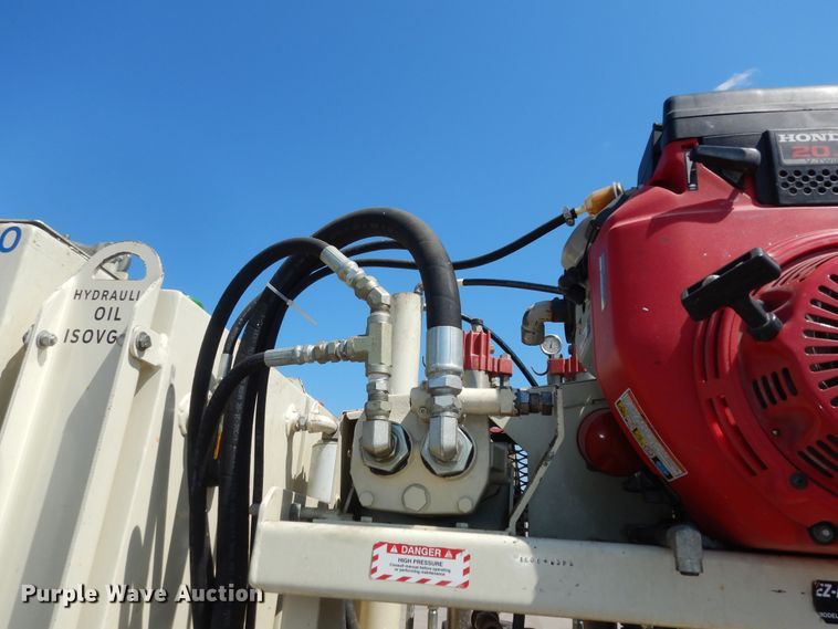 image for item LR9882 EZ-Liner AL-120  paint striper with Jim's utility trailer