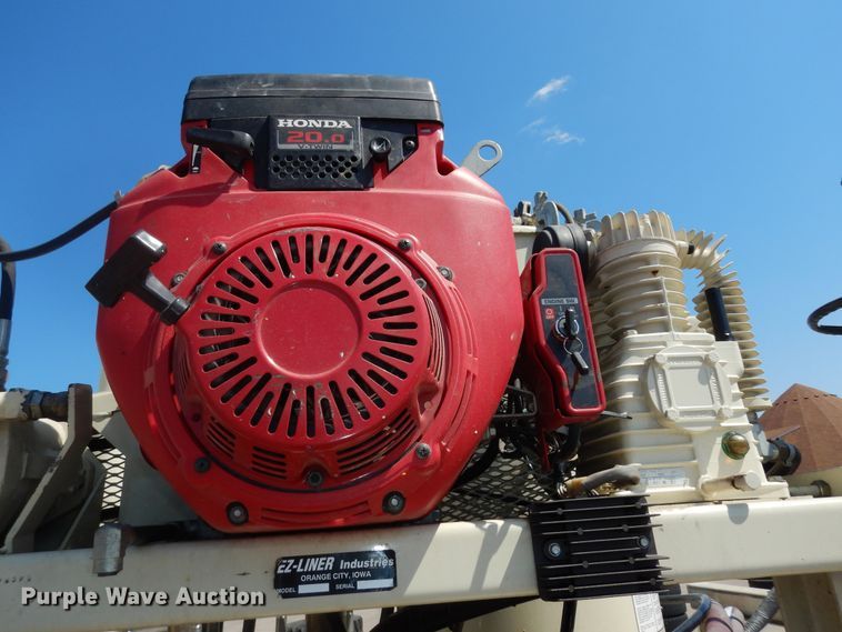 image for item LR9882 EZ-Liner AL-120  paint striper with Jim's utility trailer