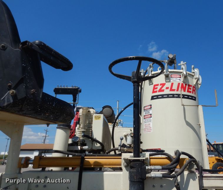 image for item LR9882 EZ-Liner AL-120  paint striper with Jim's utility trailer