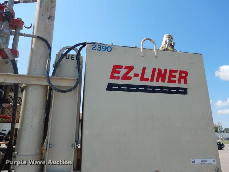 image for item LR9882 EZ-Liner AL-120  paint striper with Jim's utility trailer