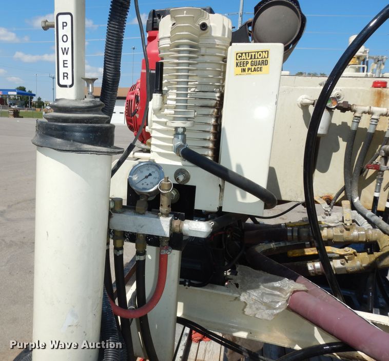 image for item LR9882 EZ-Liner AL-120  paint striper with Jim's utility trailer