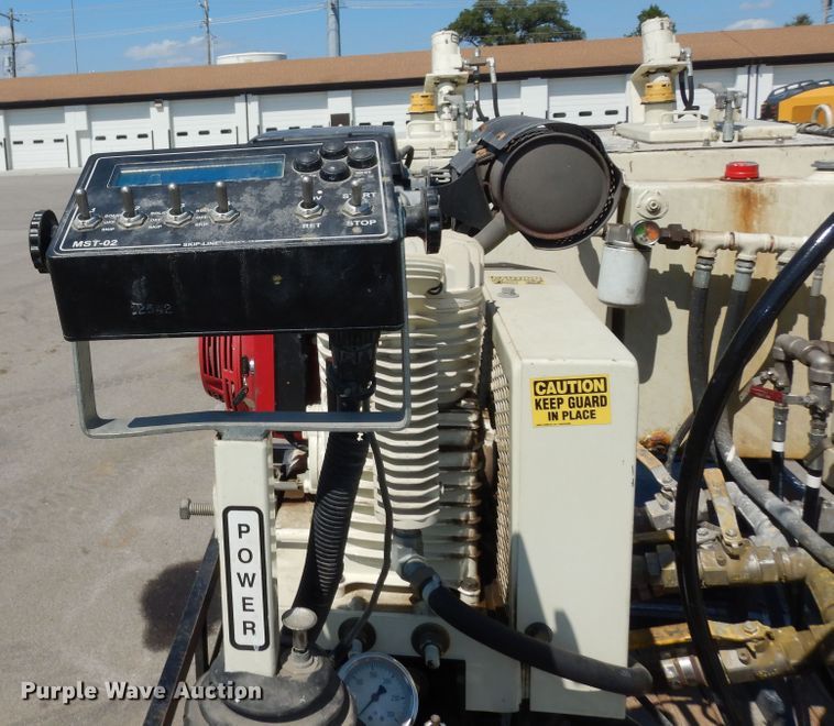 image for item LR9882 EZ-Liner AL-120  paint striper with Jim's utility trailer