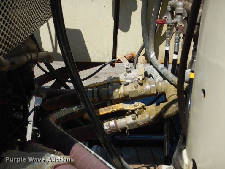 image for item LR9882 EZ-Liner AL-120  paint striper with Jim's utility trailer