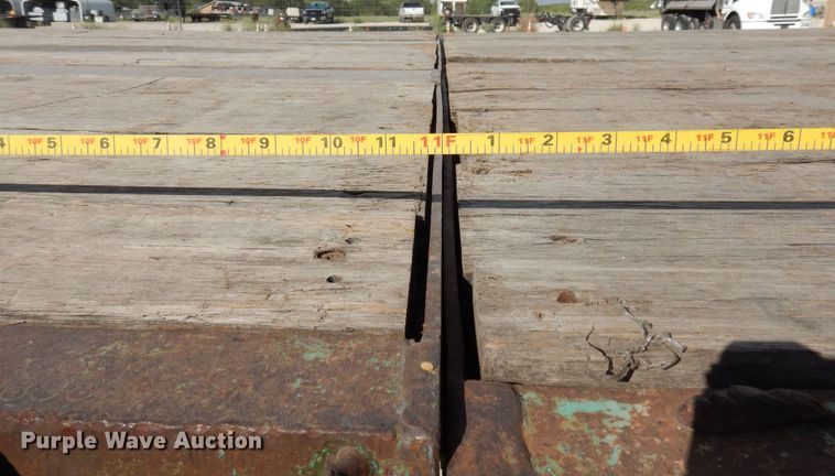 image for item HB9760 1990 Fontaine TP-3-4570A extendable flatbed trailer