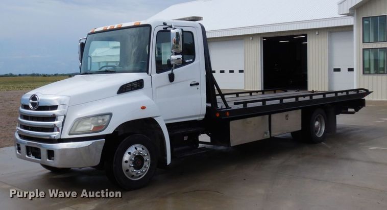 image for item MH9157 2012 Hino 268A  rollback truck