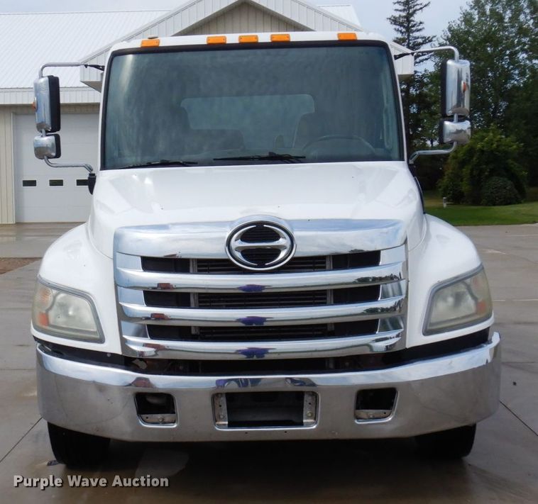 image for item MH9157 2012 Hino 268A  rollback truck