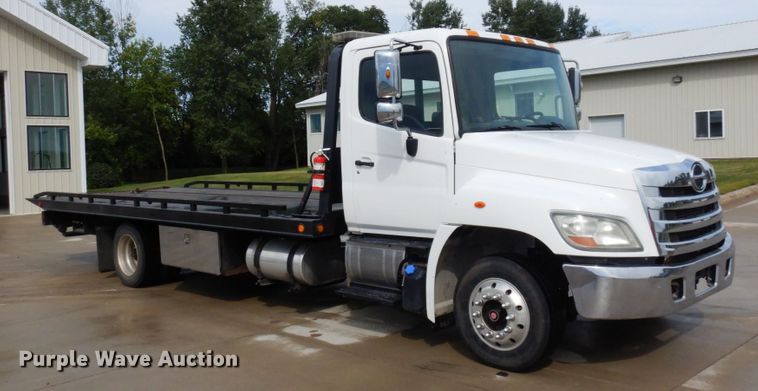 image for item MH9157 2012 Hino 268A  rollback truck