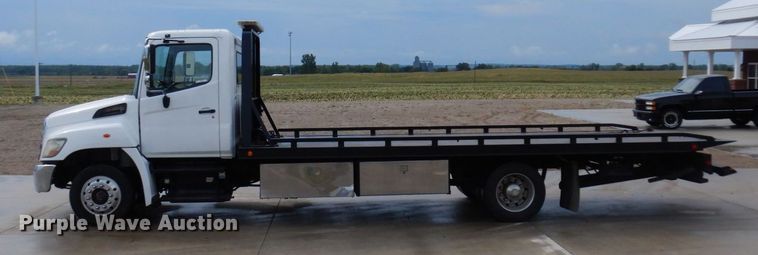 image for item MH9157 2012 Hino 268A  rollback truck