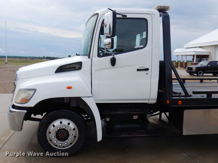 image for item MH9157 2012 Hino 268A  rollback truck