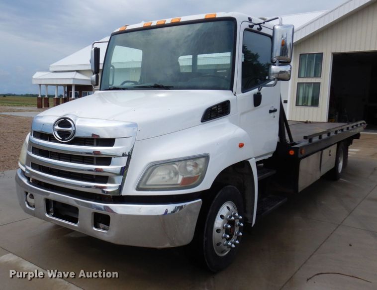 image for item MH9157 2012 Hino 268A  rollback truck