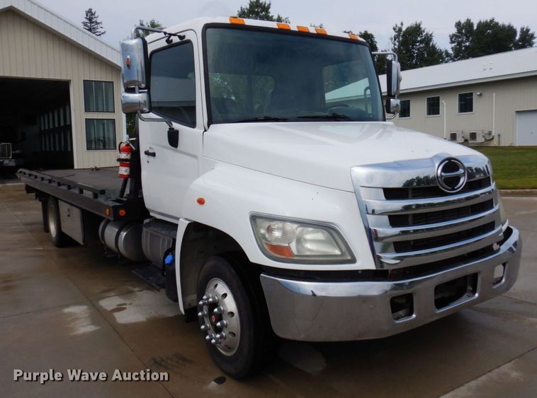 image for item MH9157 2012 Hino 268A  rollback truck