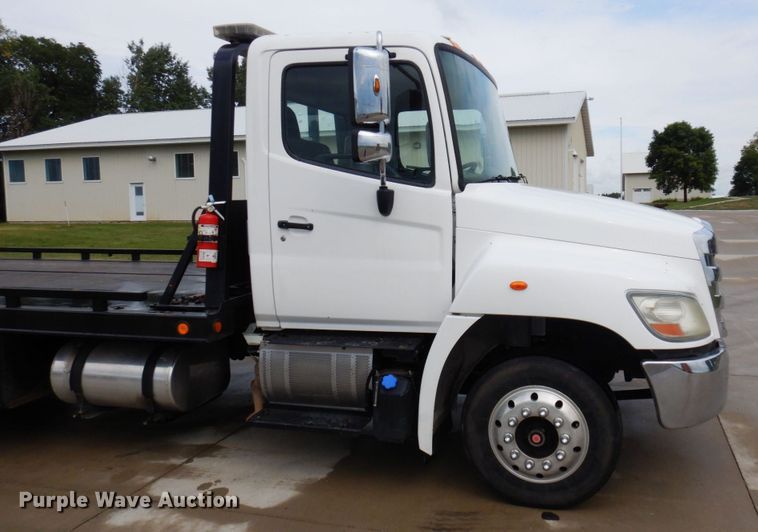 image for item MH9157 2012 Hino 268A  rollback truck