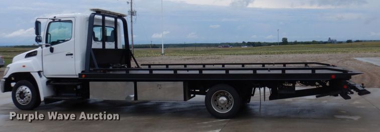 image for item MH9157 2012 Hino 268A  rollback truck