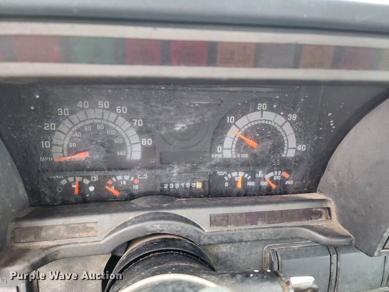 image for item DL6703 2000 GMC C6500  rollback truck