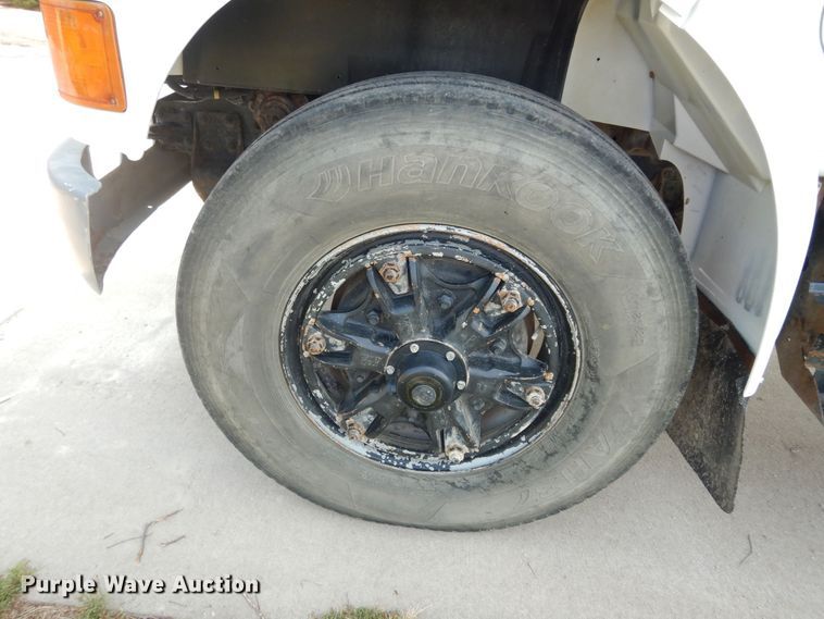 image for item DM3126 1999 International 4700  refuse truck