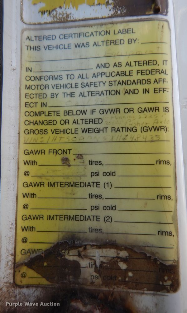 image for item DM3126 1999 International 4700  refuse truck