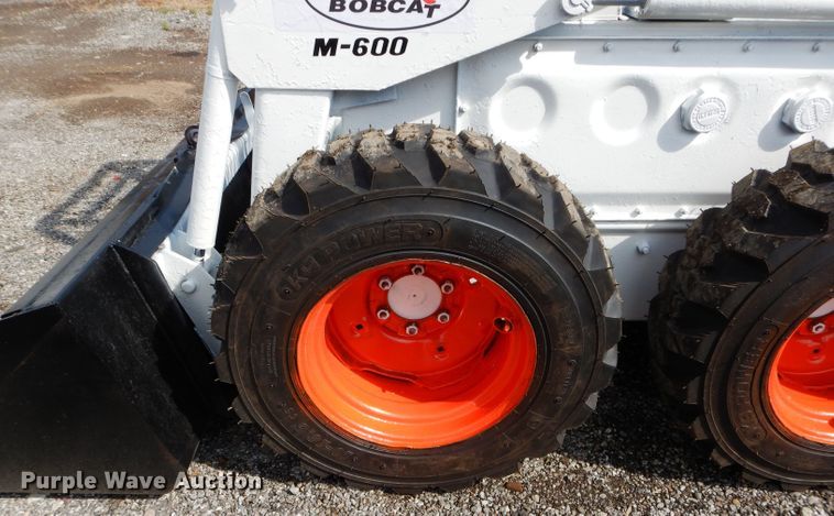 image for item JX9111 Melroe M600  skid steer loader