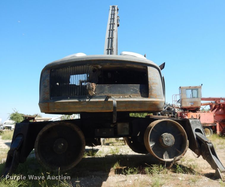 image for item DM3130 2013 Exodus MX447HDR  long reach wheeled excavator