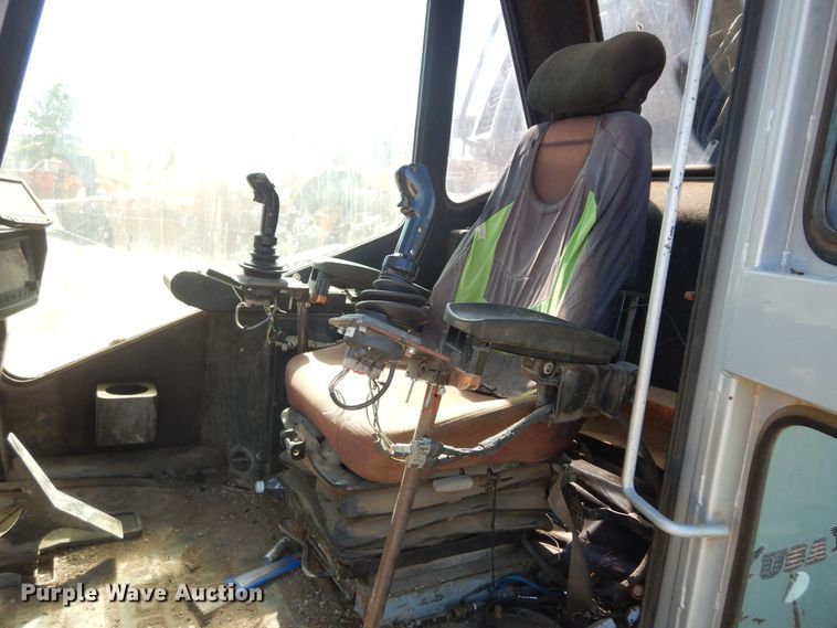 image for item DM3130 2013 Exodus MX447HDR  long reach wheeled excavator