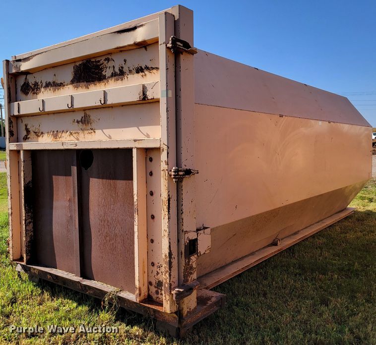 image for item DM8043 Wastequip  roll-off trash compactor dumpster
