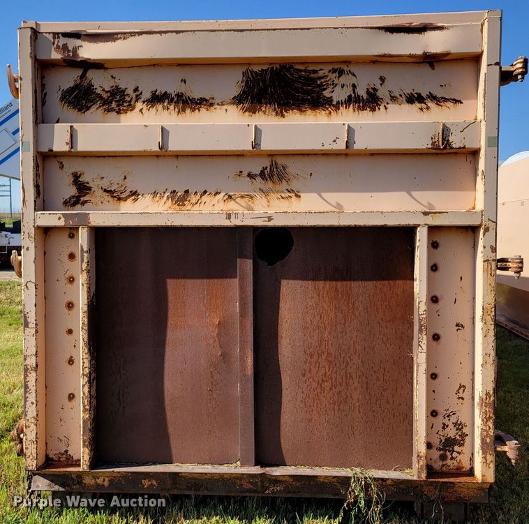 image for item DM8043 Wastequip  roll-off trash compactor dumpster