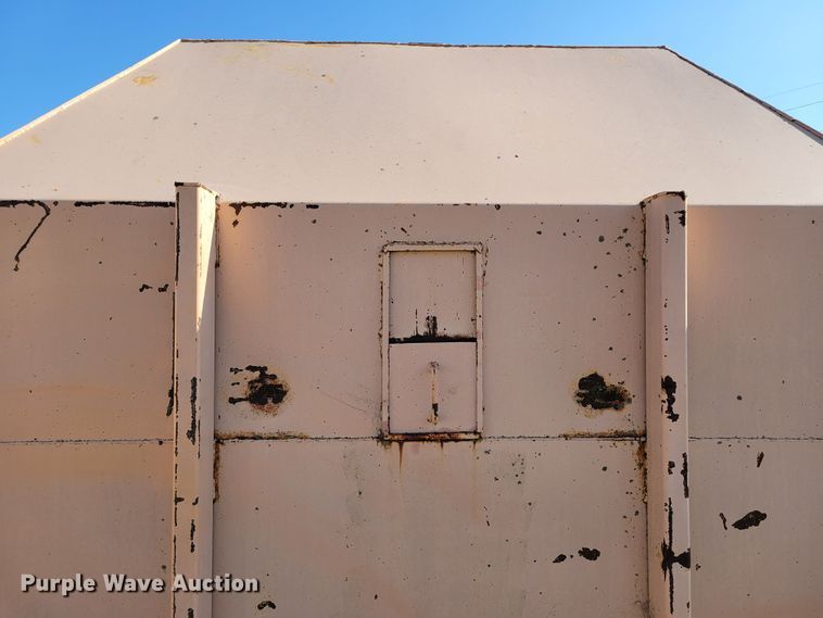 image for item DM8043 Wastequip  roll-off trash compactor dumpster