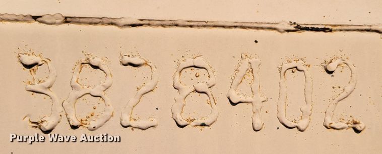 image for item DM8043 Wastequip  roll-off trash compactor dumpster