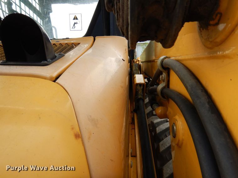 image for item DR0540 2000 John Deere 250  skid steer loader