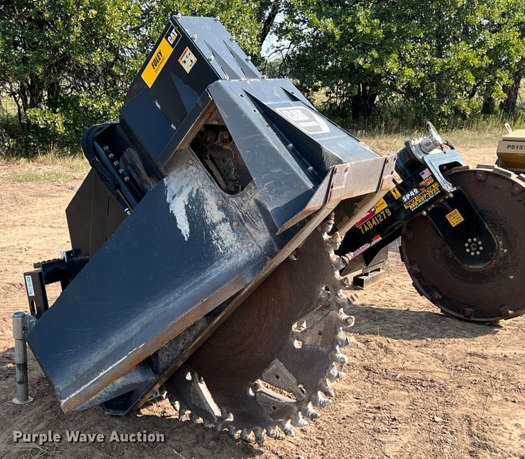 image for item IA9182 2012 Caterpillar SW460B-80  skid steer rock saw