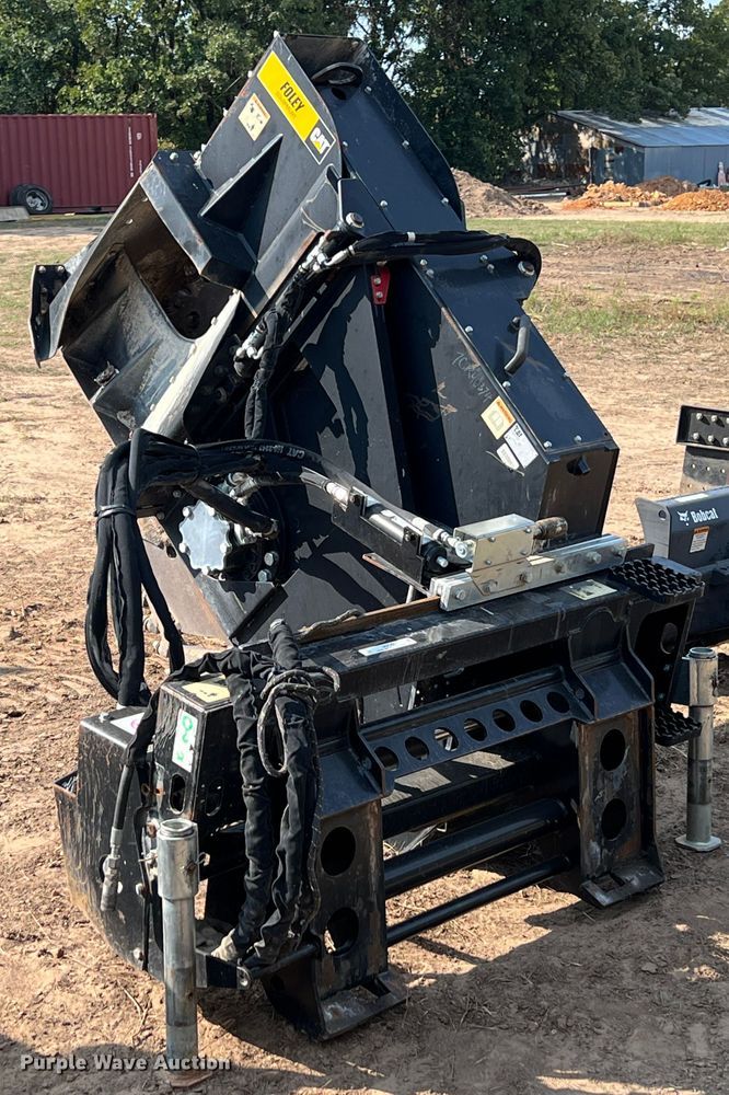 image for item IA9182 2012 Caterpillar SW460B-80  skid steer rock saw