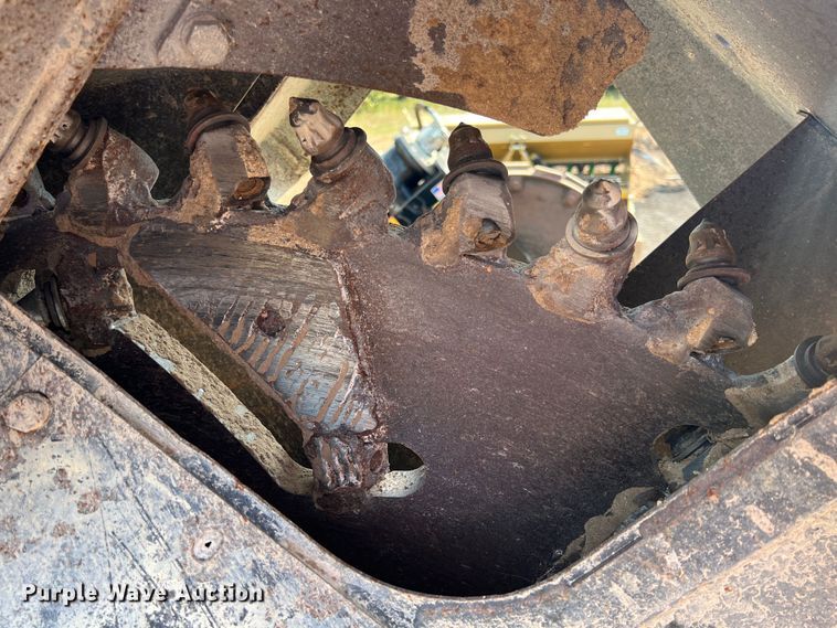 image for item IA9182 2012 Caterpillar SW460B-80  skid steer rock saw