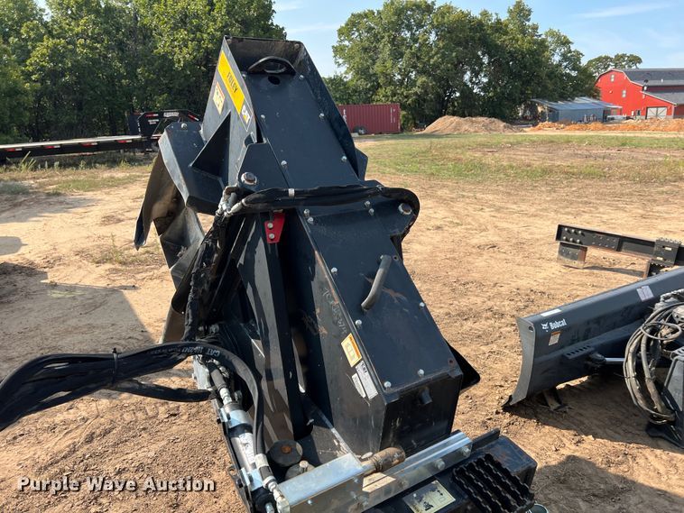 image for item IA9182 2012 Caterpillar SW460B-80  skid steer rock saw