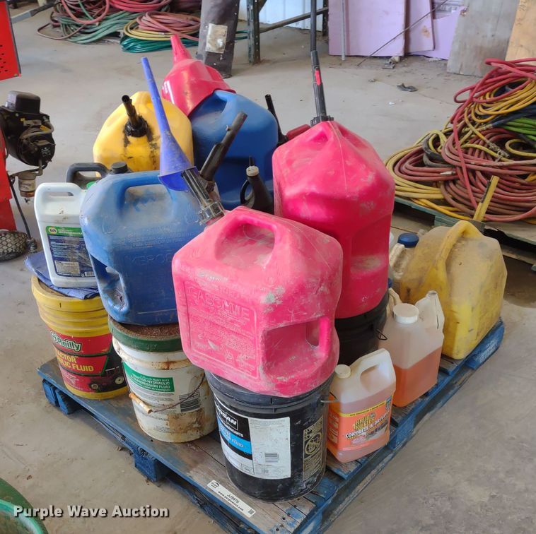 image for item JJ9976 Pallet of fuel cans and oil