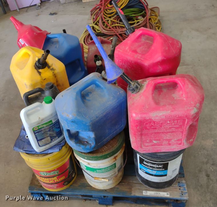 image for item JJ9976 Pallet of fuel cans and oil