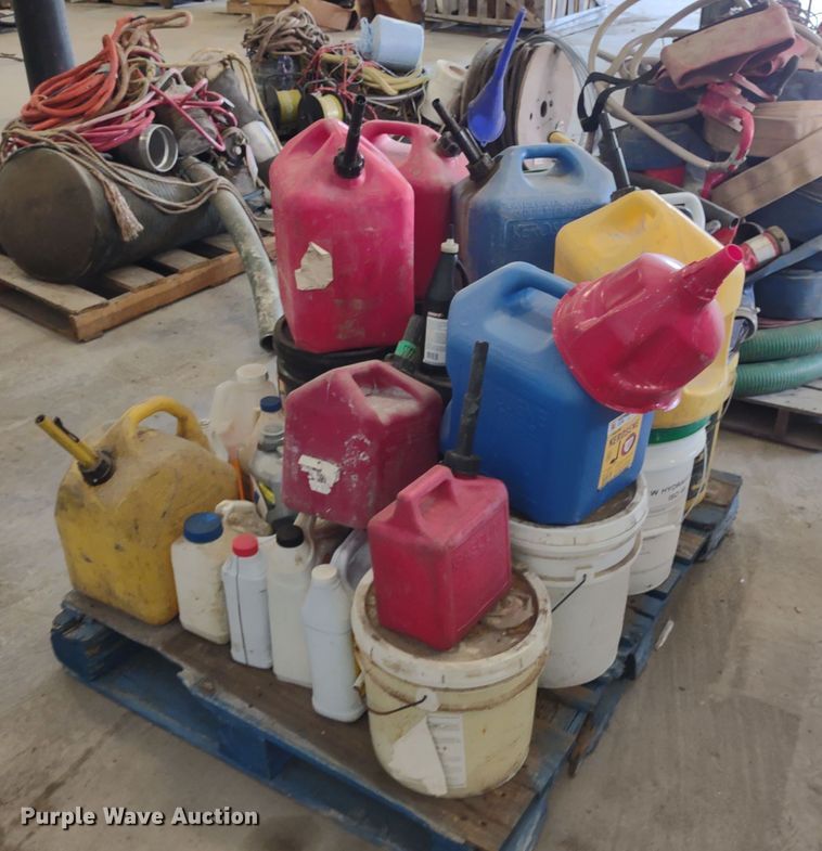 image for item JJ9976 Pallet of fuel cans and oil