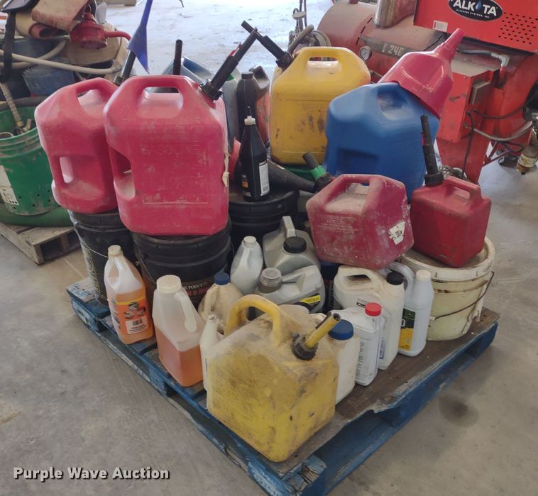 image for item JJ9976 Pallet of fuel cans and oil