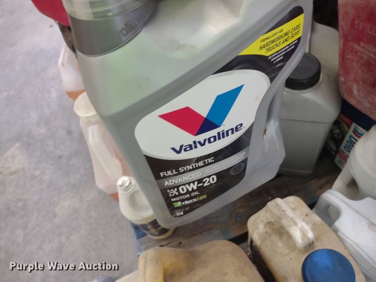 image for item JJ9976 Pallet of fuel cans and oil