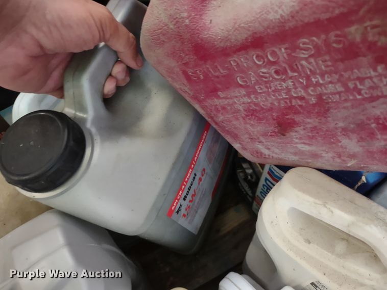 image for item JJ9976 Pallet of fuel cans and oil